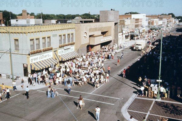 Residents gather on a downtown street in New Ulm