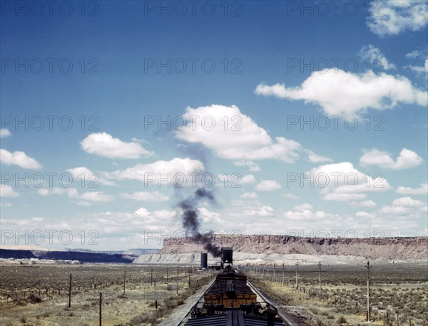 Santa Fe R.R. train stopping for coal and water