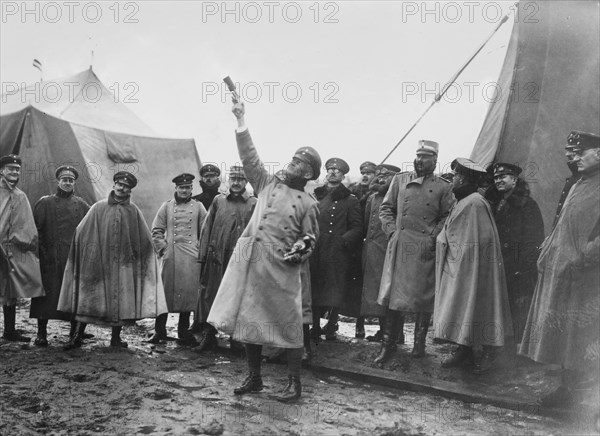 German officer showing soldiers how to use flares (light balls) in Suwalki, Poland during World War I ca. 1914-1915