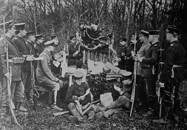 German soldiers gathered around a Christmas tree, outside during World War I ca. 1914-1915