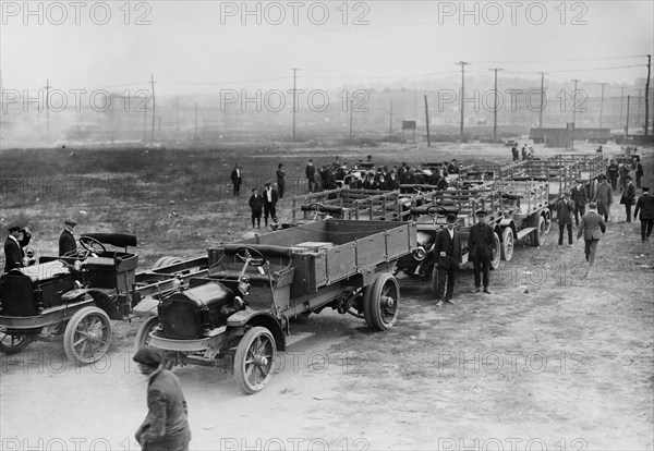 Automobiles and trucks, probably requisitioned for the war effort in Russia during World War I