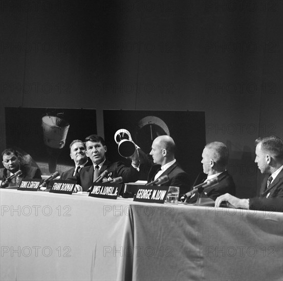 (3 Jan. 1966) View of the Gemini 6 and 7 press conference. From right to left are NASA Administrator James E. Webb; MSC Deputy Director George M. Low; and astronauts James A. Lovell Jr., Frank Borman, Thomas B. Stafford and Walter M. Schirra.