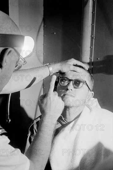 (19 Jan. 1966) Astronaut Frank Borman, command pilot for the Gemini-7 mission, has his vision checked during a postflight medical exam.