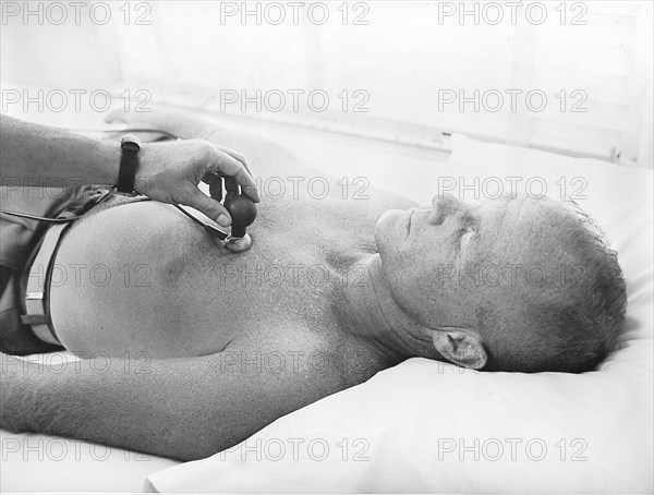 1961 - Astronaut John Glenn has biosensor attached to body during training