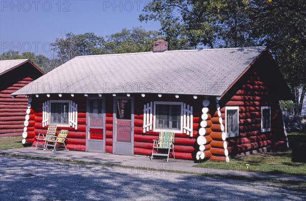 1980s United States -  Tawas Inn cabins two-unit diagonal view Route 23 East Tawas Michigan ca. 1988