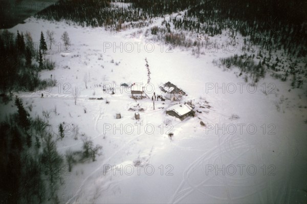 Aerial view of Salmon River roadhouse ca. March 1974