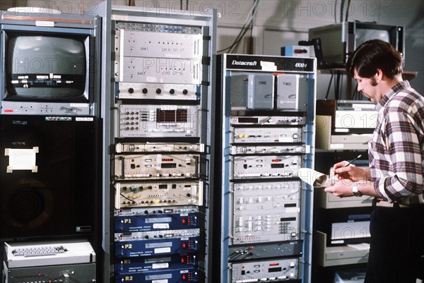 A technician doing a weather physics experiment