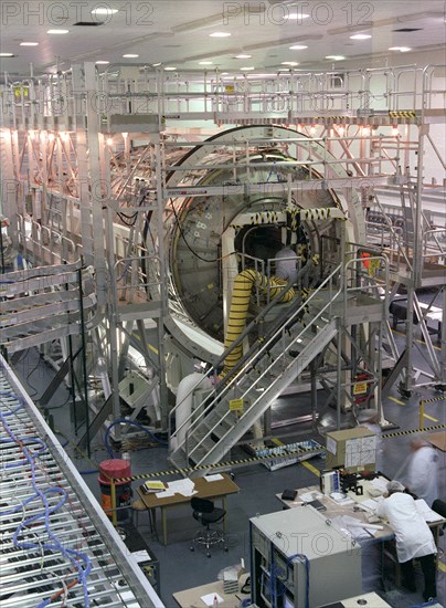 U.S. Laboratory Module (also called Destiny) for the International Space Station (ISS) is shown under construction in the West High Bay of the Space Station manufacturing facility (building 4708) at the Marshall Space Flight Center ca. 1997