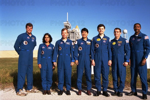 Crew of the STS-87 mission poses at the pad during a break in the Terminal Countdown Demonstration Test (TCDT) at KSC ca. 1997