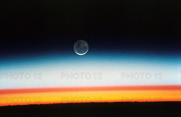 (22 Oct.-1 Nov. 1992) --- As the Space Shuttle Columbia orbited Earth in an easterly direction over the Indian Ocean, moonrise was followed quickly by sunrise.