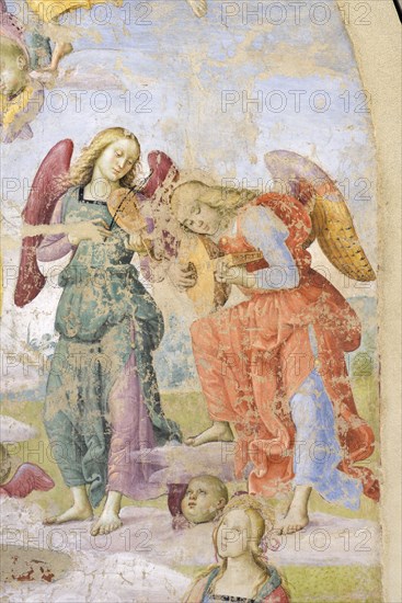 Panicale (Italy, Umbria, province of Perugia), Church of San Sebastiano. Madonna and Child, Musician Angels and Saints Augustine and Mary Magdalene, attribution to Raffaello Sanzio, fresco, around 1504. Detail