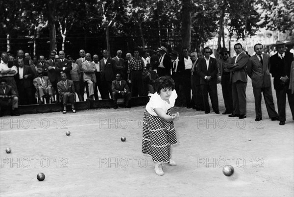 jeune joueur de pétanque, 1958