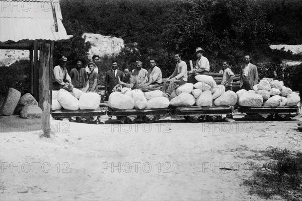 Italy. Tuscany. Castellina Marittima. Workers In Front Of The Alabaster Warehouse. 1920