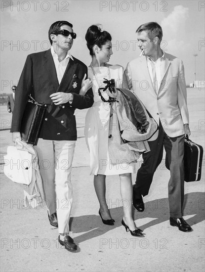 George Hamilton, George Peppard and Rosanna Schiaffino.