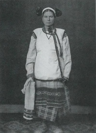 Russian woman in traditional folk costume circa  before 1917