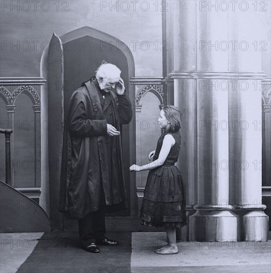 Jessica and the vicar standing at the church door.