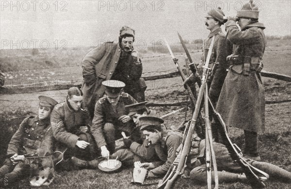 British soldiers playing cards whilst behind enemy lines during WWI.