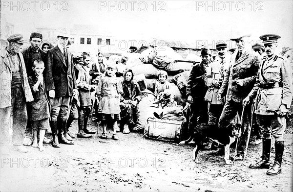 WW1 gathering of people, children and senior officers and diplomats.