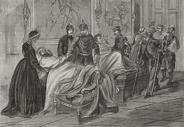 Franco-Prussian War (1870-1871). King William I of Prussia (1797-1888) visiting the wounded in hospitals. Engraving. ""Historia de la Guerra de Francia y Prusia"" (History of the War between France and Prussia). Volume II. Published in Barcelona, 1871.