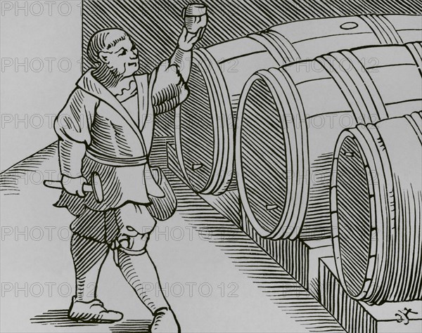 The sommelier in his function. Engraving after a woodcut in Sebastian Monster's ""Cosmographia universalis"", published in Basel in 1552. ""Moeurs, usages et costumes au moyen-age et a l'epoque de la Renaissance"", by Paul Lacroix. Paris, 1878.