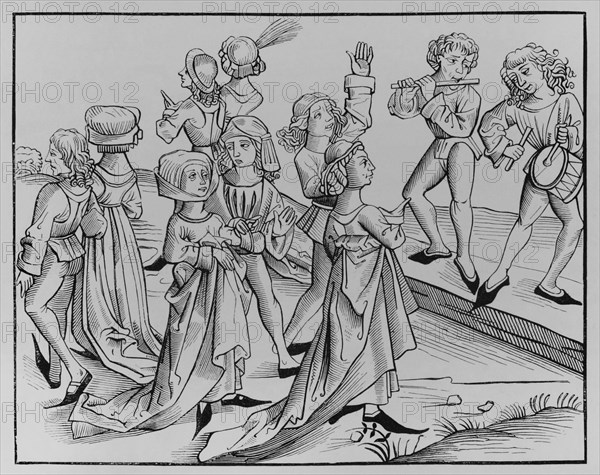 Dancers on Christmas Night punished for their impiety and condemned to dance for a whole year. 15th-century legend. Facsimile of an engraving by Wohlgemuth in ""Liber Chronicarum Mundi"", Nuremberg, 1493. ""Moeurs, usages et costumes au moyen-age et a l'epoque de la Renaissance"", by Paul Lacroix. Paris, 1878.