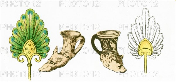 The illustration here shows ancient Greek artifacts. They are from left to right: a fan, two drinking horns, and a fan. The illustration dates to 1882.