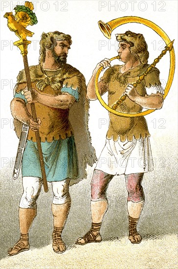 The figures represent ancient Roman military personnel, from left to right: a standard bearer and a horn-blower.