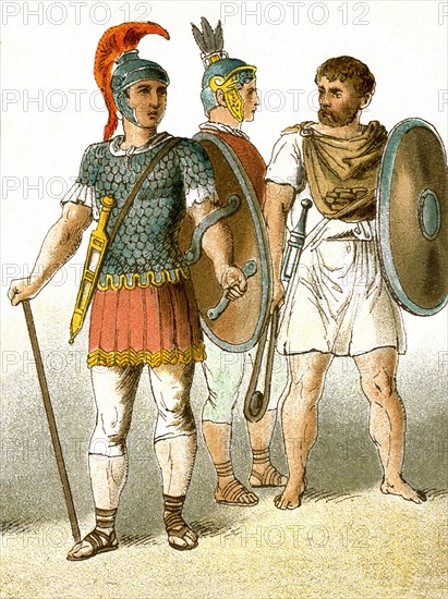 The figures represent three ancient Roman military soldiers. The illustration dates to 1882.