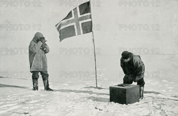 This photo shows Captain Roald Amundsen Taking Sights at the South Pole. The caption continues from a photograph, by permission of Mr. John Murray and the Illustrated London News. Amundsen was a Norwegian explorer of polar regions and a key figure of the Heroic Age of Antarctic Exploration. He led the first expedition to traverse the Northwest Passage by sea, from 1903 to 1906, and the first expedition to the South Pole in 1911.