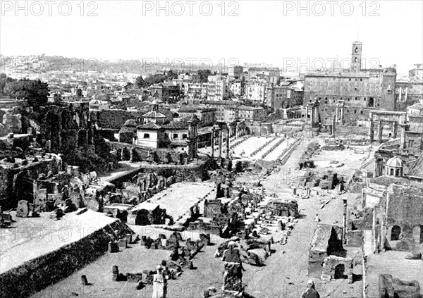 In ancient Rome, the forum was the market and meeting place and consisted of an open square surrounded by public buildings. The best known forum is the one in Rome, pictured here in a 1900 photograph. The orientation is facing west. The three standing columns were once part of the Temple of Castor and Pollux. In front of them are the remains of the house of the Vestal Virgins. Behind is the Julian Basilica. To the right is the Sacra Via (Sacred Way) .