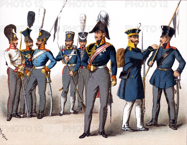 The figures pictured here represent Prussian military. From left to right, they are: Cuirassier 1814, Uhlan, Dragoon, infantry of the line, Hussar, General, Silesian Militia, and Militia Cavalry. The illustration dates to 1882.