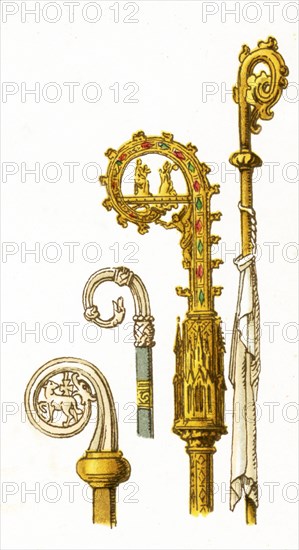 Shown in this image are a variety of croziers related to the Christian Church. They are, from left to right: crozier from 11th century, crozier from 12th century, two croziers from 14th century. The illustration dates to 1882. .