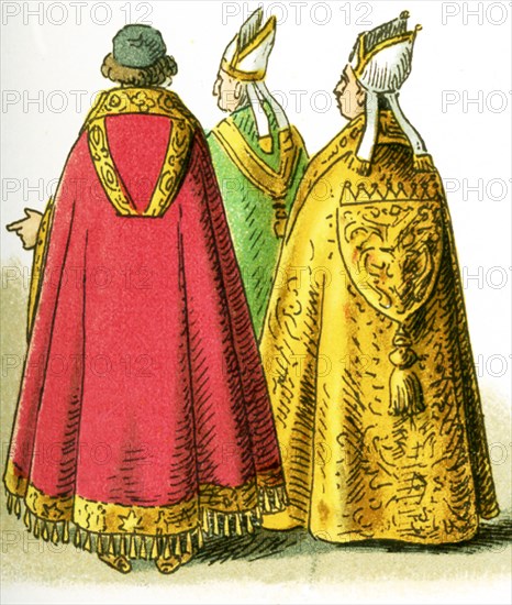 The images here all feature ecclesiastical Costume, from the 11th century through the 19th century. They are from left to right: the pluvial or choral hood worn at the end of the 13th century, the Pluvial or Choral hood of a priest at the end of the 15th century, the Pluvial or Choral hood in the 19th century. The illustration dates to 1882. .