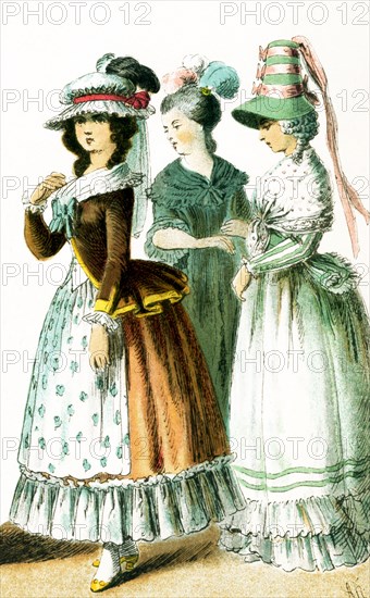 Shown here are French women between 1750 and 1800. They are from left to right: two ladies in 1785 and a lady in 1790.This illustration dates to 1882.