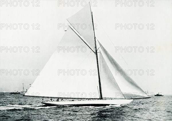 This photo shows the America Cup defender Columbia that was launched in 1899. She was the defender of the tenth America's Cup race that same year against British challenger Shamrock as well as the defender of the eleventh America's Cup race in 1901 against British challenger Shamrock II. She was the first vessel to win the trophy twice in a row. The deisgner was Nathanael Greene Herreshoff.