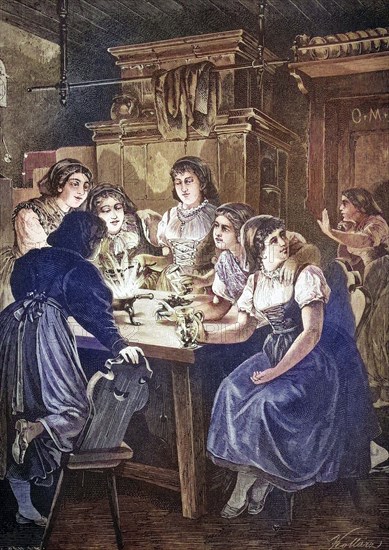 Group of women pouring lead on New Year's Eve.