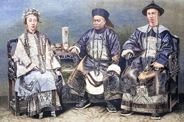 War mandarin and civilian mandarin next to a mandarin woman in imperial China.