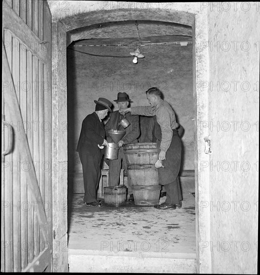 New Year's Eve wine is bottled in Zofingen in 1941.