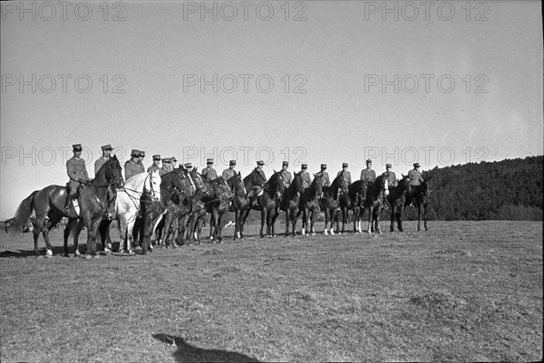 Willow near Chevenez. Cavalrymen riding their horses