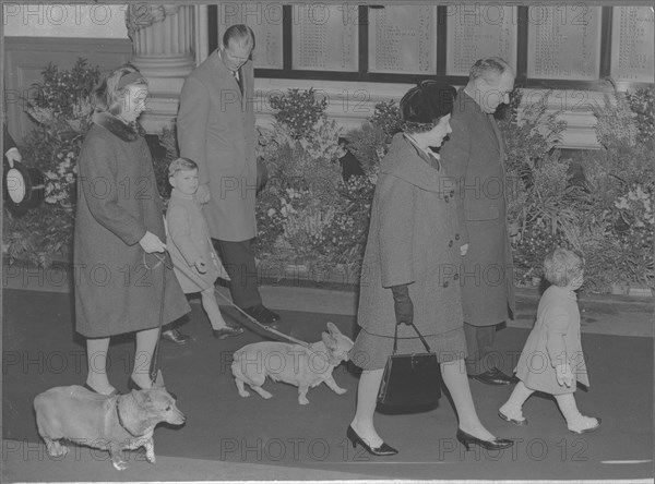 From left to right: Anne, Andrew, Philip, Elizabeth, unknown man, Viscount Linley (son of princess Margaret and Earl Snowdon).