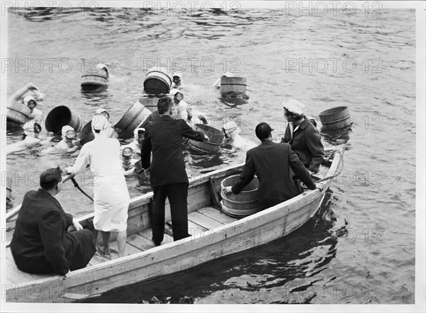 Alexandra (R) visiting a pearl farm in Toba, state Mie; pearl divers.