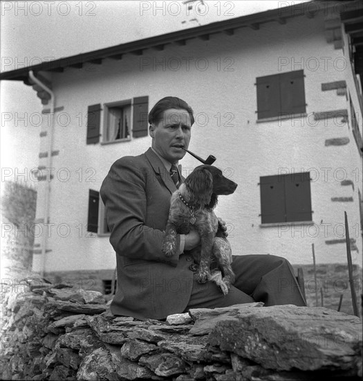 Maurice Zermatten with dog around 1959.