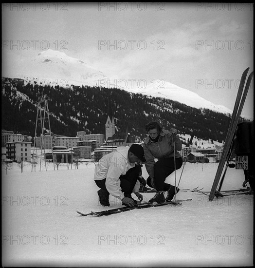 Anne of Bourbon-Parma is helped by her ski instructor, Davos 1948.