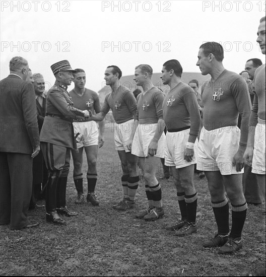 General Guisan greets the Swiss national soccer team, 1939.