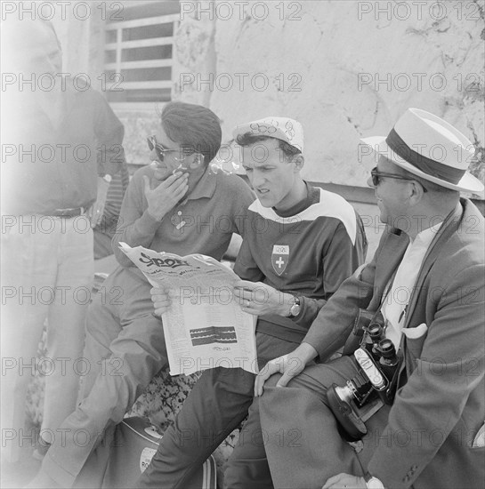 Olympic Games Rome 1960: Bruno Galliker reading newspaper Sport.