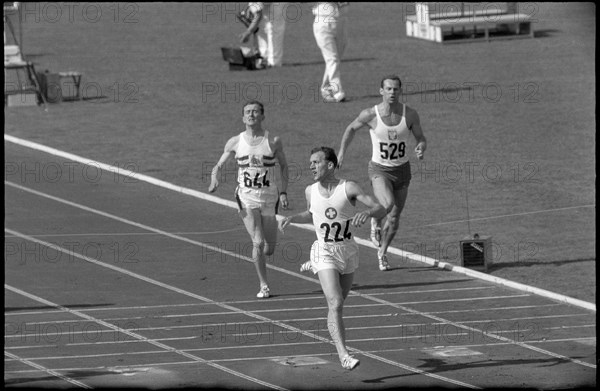 Rome 1960: heat 400m hurdles; Galliker wins ahead of Boyes(L) and Krol.