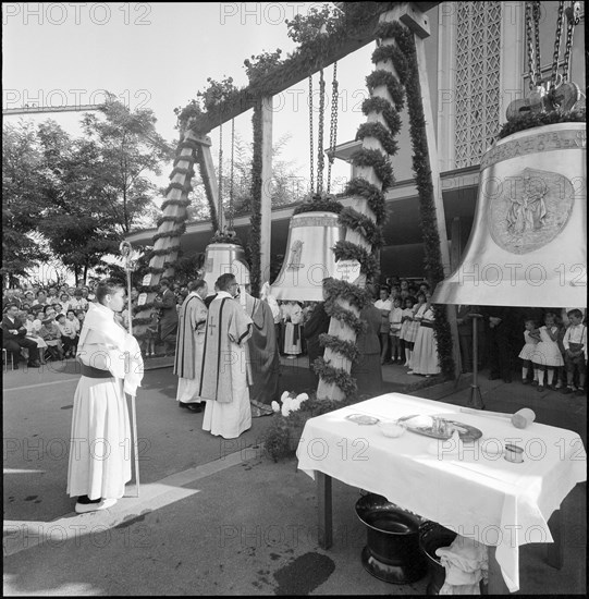 Ceremonious lifting of church bells at the tower of Albisrieden, Zurich 1959.