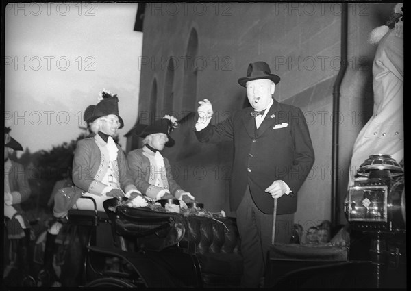 Winston Churchill standing on a coach, Berne 1946.