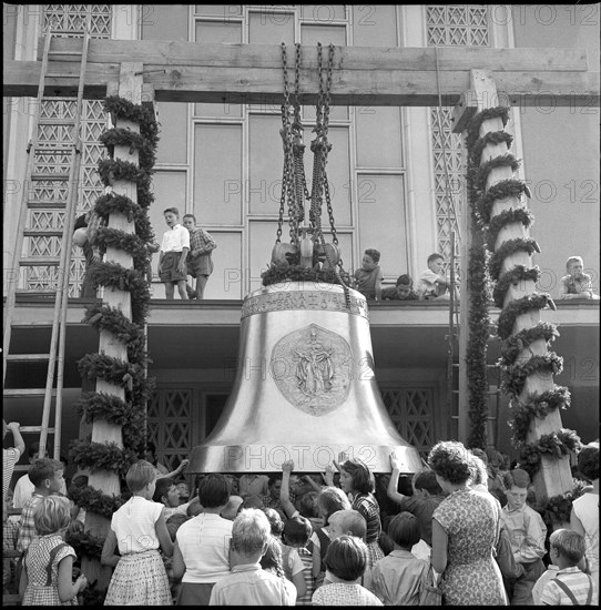 Ceremonious lifting of church bells at the tower of Albisrieden, Zurich 1959.