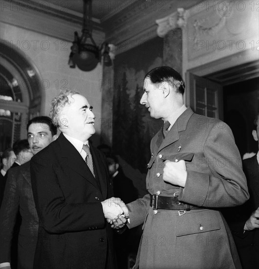 General Charles de Gaulle, right,  in Geneva, 1946.